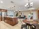 Inviting living room with a large island, an open floor plan, and stainless steel appliances at 2823 St Croix Dr, Clearwater, FL 33759