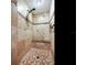 The bathroom features a tiled shower with built in seat and a handheld showerhead at 2823 St Croix Dr, Clearwater, FL 33759