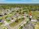 Aerial view showing residential area; this home is located on a cul-de-sac backing to a green space with a tree line at 3020 Silva Wood Dr, Valrico, FL 33596