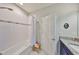 Bathroom features a shower over tub at 3020 Silva Wood Dr, Valrico, FL 33596