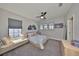 Bright bedroom with window seat and ample natural light at 3020 Silva Wood Dr, Valrico, FL 33596