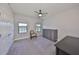 Clean bedroom with built-in storage, offering a cozy space with great natural light at 3020 Silva Wood Dr, Valrico, FL 33596