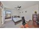 Bedroom features a window seat and ceiling fan at 3020 Silva Wood Dr, Valrico, FL 33596