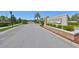 Stone monument sign welcomes to Ridgewood Estates; gated entrance and landscaped grounds are visible at 3020 Silva Wood Dr, Valrico, FL 33596