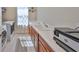 Practical laundry room with ample counter space, modern appliances, and efficient design at 3020 Silva Wood Dr, Valrico, FL 33596