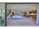 An open-concept living area leads to a modern kitchen and dining area, with access to the backyard at 3020 Silva Wood Dr, Valrico, FL 33596