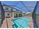 Inviting pool with a screened enclosure offering a great backyard view at 3020 Silva Wood Dr, Valrico, FL 33596