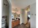Well-lit bathroom with double sinks, vanity, and tiled floor at 3215 Coconut Grove Rd, Land O Lakes, FL 34639