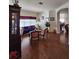 Cozy living room with hardwood floors and comfortable seating next to an archway at 3215 Coconut Grove Rd, Land O Lakes, FL 34639