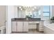 Bright bathroom features a gray countertop, modern vanity, shower, and soaking tub at 32423 Rosewood Meadow Ln, Wesley Chapel, FL 33543