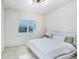 Bedroom with white walls, white furnishings, and a ceiling fan at 32423 Rosewood Meadow Ln, Wesley Chapel, FL 33543