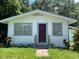 Charming home featuring a classic facade with tidy landscaping at 38030 Howard Ave, Dade City, FL 33525