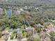Aerial view of a lush lot, ideal for building your custom home within a serene environment at 405 Apache Trl, Brandon, FL 33511