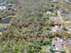 An aerial shot of a lot nestled in a verdant setting, perfect for your dream home at 405 Apache Trl, Brandon, FL 33511