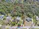 An aerial view of a lot with beautiful surrounding greenery ready for building a home at 405 Apache Trl, Brandon, FL 33511
