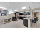 Basement kitchen with modern appliances, sleek cabinetry, and marble countertops at 405 Apache Trl, Brandon, FL 33511