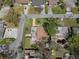 An aerial view shows this single Gathering home with a fenced in yard and a back patio at 4630 W Bay Villa Ave, Tampa, FL 33611