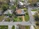 A bird's eye view of the property, highlighting the lawn and the surrounding neighborhood at 4630 W Bay Villa Ave, Tampa, FL 33611