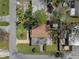 An aerial view shows this single Gathering home with a fenced in yard and a back patio at 4630 W Bay Villa Ave, Tampa, FL 33611