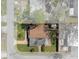 An aerial view shows this single Gathering home with a fenced in yard and a back patio at 4630 W Bay Villa Ave, Tampa, FL 33611