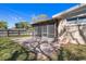 A view of the backyard's brick patio and screened in porch, offering a relaxing outdoor space at 4630 W Bay Villa Ave, Tampa, FL 33611