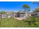 This backyard offers a brick patio and a screened-in porch, great for outdoor living at 4630 W Bay Villa Ave, Tampa, FL 33611