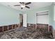 The bedroom features a ceiling fan, doorway, and closet that enhances the property's appeal at 4630 W Bay Villa Ave, Tampa, FL 33611