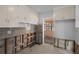 Kitchen featuring upper cabinets, gray backsplash and under-construction features at 4630 W Bay Villa Ave, Tampa, FL 33611