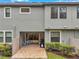 Exterior of the home showing the patio, and partially fenced yard at 5086 San Martino Dr, Wesley Chapel, FL 33543