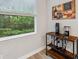 Beverage station in the kitchen next to a window with verdant greenery just outside the window at 5086 San Martino Dr, Wesley Chapel, FL 33543
