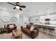 Open living room, kitchen and dining area, great for entertaining at 5086 San Martino Dr, Wesley Chapel, FL 33543