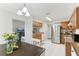 Functional kitchen open to the living room featuring stainless steel appliances and ample cabinet space at 5123 Nashville Dr, Tampa, FL 33624