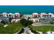 Aerial shot of waterfront condos, golf course and pool area on a sunny day at 5729 Puerta Del Sol Boulevard South # 486, St Petersburg, FL 33715