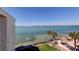 Beautiful view from balcony of water, buildings, and beach umbrellas at 5729 Puerta Del Sol Boulevard South # 486, St Petersburg, FL 33715