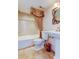 Bathroom featuring a pedestal sink, ornate mirror, and a shower-tub combination at 5729 Puerta Del Sol Boulevard South # 486, St Petersburg, FL 33715