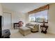 Cozy bedroom featuring a window with a shade and an armchair with ottoman at 5729 Puerta Del Sol Boulevard South # 486, St Petersburg, FL 33715