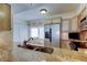 Bright kitchen features stainless steel refrigerator and cozy breakfast nook at 5729 Puerta Del Sol Boulevard South # 486, St Petersburg, FL 33715