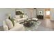 Comfortable living room featuring neutral walls and furniture and bright natural light at 5729 Puerta Del Sol Boulevard South # 486, St Petersburg, FL 33715