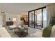Inviting living room and dining space with expansive windows offering picturesque water views at 5729 Puerta Del Sol Boulevard South # 486, St Petersburg, FL 33715