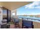 Enjoy stunning water views from this cozy balcony with seating and BBQ grill at 5915 Sea Ranch Dr # 403, Hudson, FL 34667