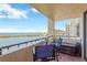 Relax on the balcony with seating and enjoy stunning views of the bay at 5915 Sea Ranch Dr # 403, Hudson, FL 34667