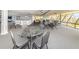 Enjoy the bright and open community area with tables and natural light at 5915 Sea Ranch Dr # 403, Hudson, FL 34667