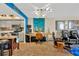 Bright open floor plan of a condo with kitchen, office, and sitting area at 5915 Sea Ranch Dr # 403, Hudson, FL 34667