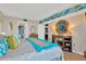 Stylish bedroom featuring modern decor, a cozy bed, and easy access to ensuite bathroom at 5915 Sea Ranch Dr # 403, Hudson, FL 34667