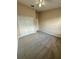 Bedroom with carpet, double closet and neutral walls at 6002 Osprey Lake Cir, Riverview, FL 33578