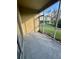 Screened patio with view of backyard at 6002 Osprey Lake Cir, Riverview, FL 33578