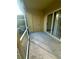 Enclosed patio features neutral tones and indoor access at 6002 Osprey Lake Cir, Riverview, FL 33578