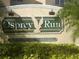 Osprey Run community sign with lush landscaping and a neighborhood feel at 6002 Osprey Lake Cir, Riverview, FL 33578