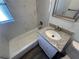 Updated bathroom featuring a tub, shower, vanity, and modern fixtures at 645 38Th S Ave, St Petersburg, FL 33705