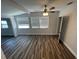 Bright room with wood-look flooring and views of the outdoors at 645 38Th S Ave, St Petersburg, FL 33705